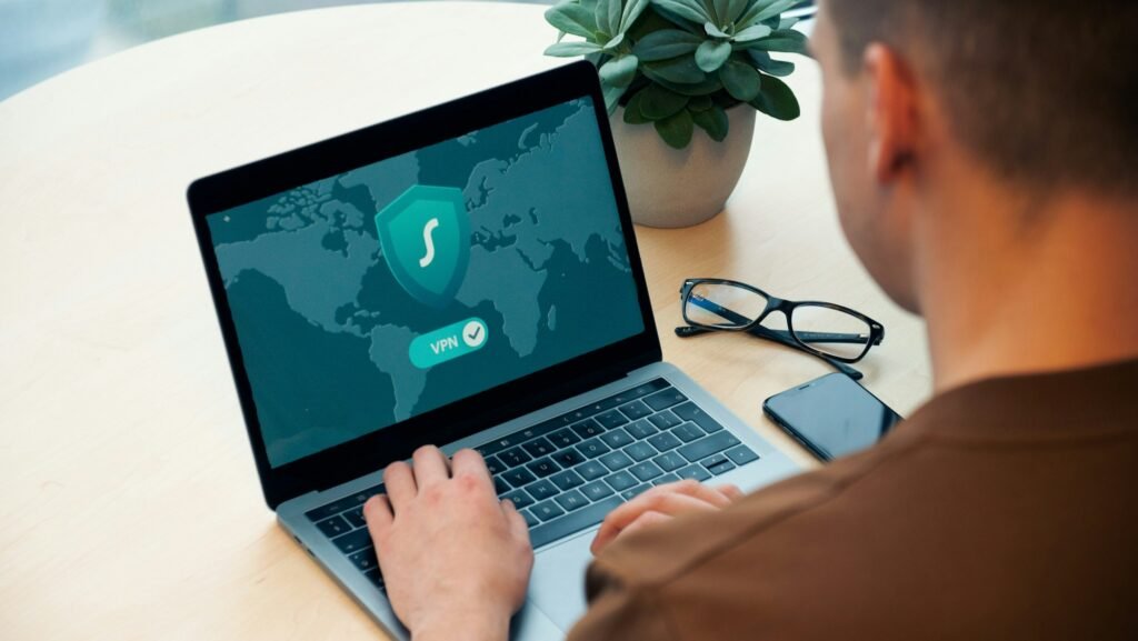 Person using a laptop displaying a VPN connection interface