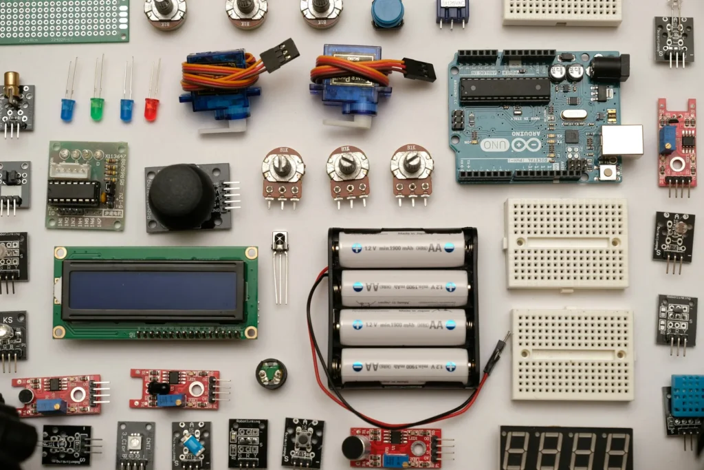 Electronic components arranged on a white surface